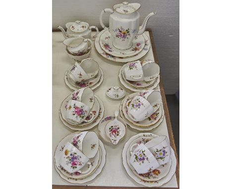 A Royal Crown Derby Derby Posies pattern tea service, printed mark  Chip on rim on the smaller of the two teapots. Note the t