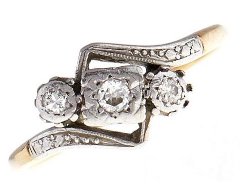 A three stone diamond ring, in gold marked 18ct PLAT, 2.7g, size P  Wear consistent with age, claws slightly faulty