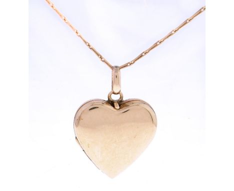A 9ct gold heart shaped locket,&nbsp;20mm, Chester 1958 and a 9ct gold necklet, 4.4g  Light wear and scratches, no engraving