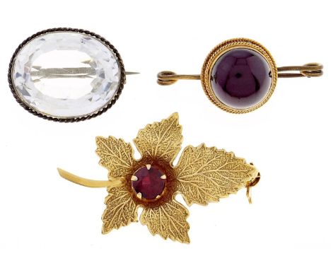 A garnet leaf brooch, in 9ct gold, 31mm, by Ward Brothers, Edinburgh 1962, a Victorian foiled amethyst set gold jewel on late