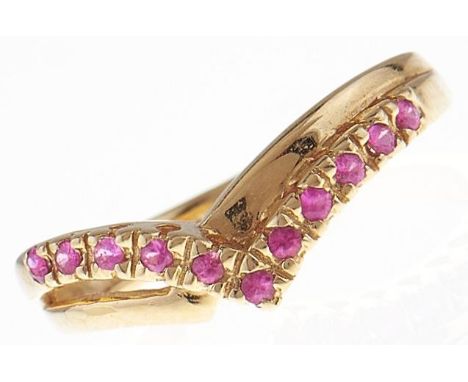 A ruby dart ring, in 18ct gold, 2.8g, size N  Good condition