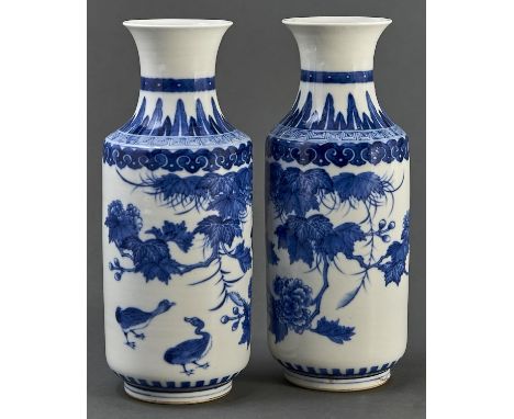 A pair of Chinese blue and white cylindrical vases,&nbsp;with waisted neck, decorated with geese and flowering boughs, 21.5cm