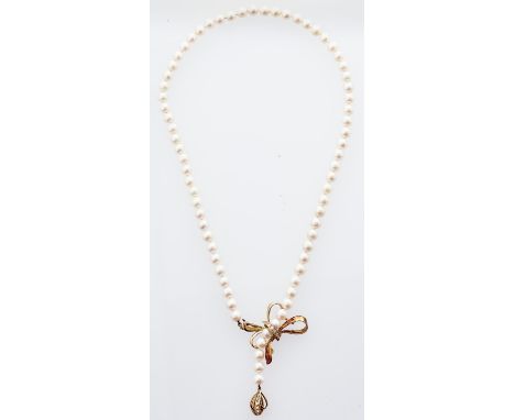 A cultured pearl necklace with diamond set 14ct gold bow clasp, 30g  Good condition