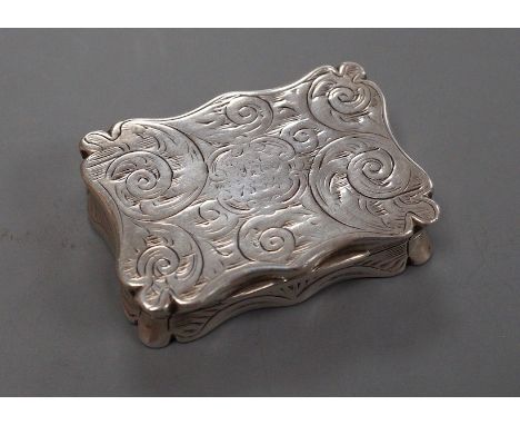 A Victorian engraved silver shaped rectangular snuff box, Edward Smith, London, 1855, 37mm (bale hole? on one side).