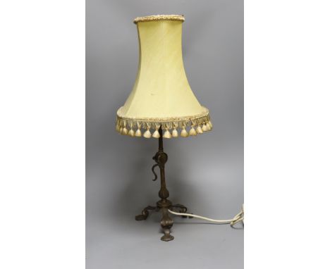 An Arts &amp; Crafts style adjustable metal desk lamp,33.5 cms high,