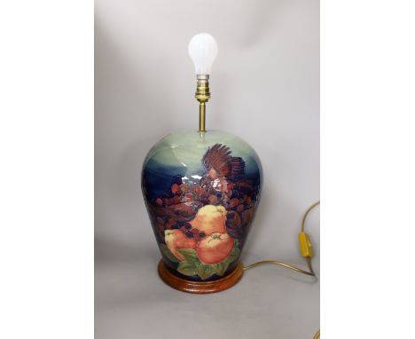 A Moorcroft pottery 'finches and fruit' vase lamp, 33cm to top of pottery
