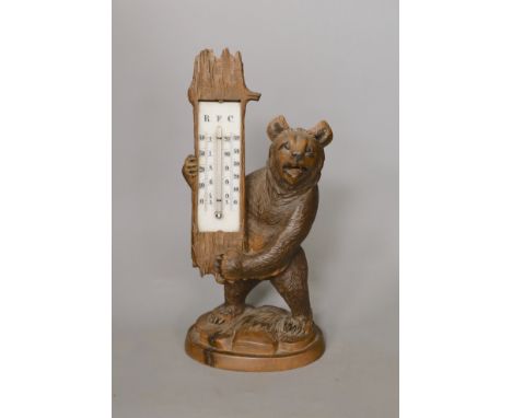 A Black Forest carved bear thermometer, 31cm