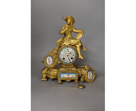 A 19th century French gilt brass figural mantel clock a.f., 32cm