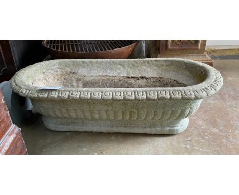 A reconstituted stone garden planter, width 89cm, depth 38cm, height 28cm