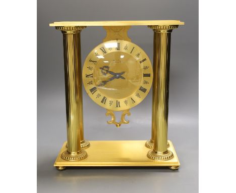 A contemporary Hour Lavigne gilt metal cased quartz mantel clock
