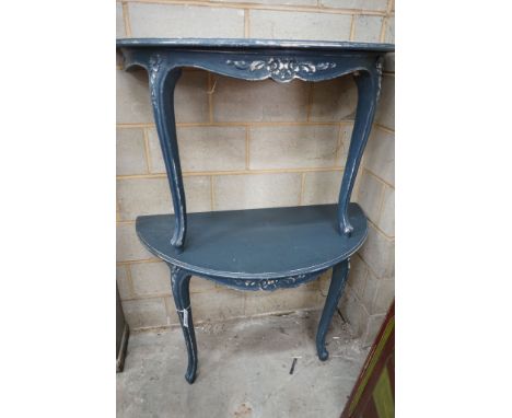 A pair of Louis XVI style painted demi lune console tables, width 112cm, depth 56cm, height 75cm