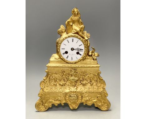 A 19th century French ormolu mantel clock, Henri Marc movement with silk suspension, and pendulum