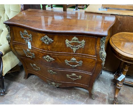 An 18th century Dutch walnut bombe commode, width 109cm, depth 55cm, height 83cm