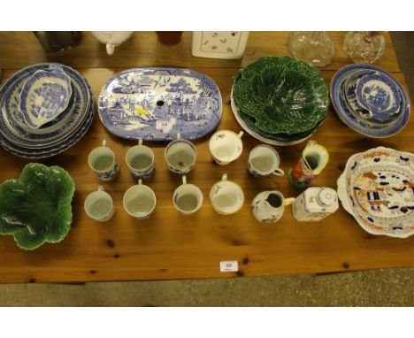 A quantity of various blue and white china; green glazed leaf plates; a Dresden tea caddy etc.