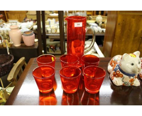 A ruby glass lemonade set