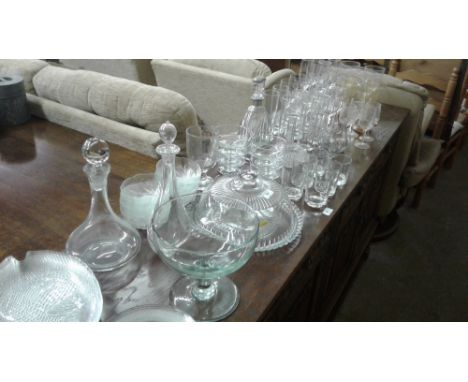 A quantity of various glassware to include drinking glasses; an Orrefors glass decanter; fish plates; a pedestal bowl etc.