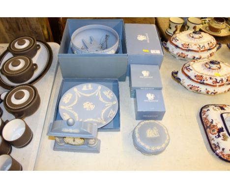 A quantity of Wedgwood jasper ware items to include a pedestal bowl, a mantel clock etc. - some with original boxes 