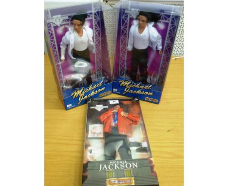 2 MICHAEL JACKSON DOLLS AND A MICHAEL JACKSON OUTFIT