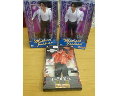 2 MICHAEL JACKSON DOLLS AND A MICHAEL JACKSON OUTFIT