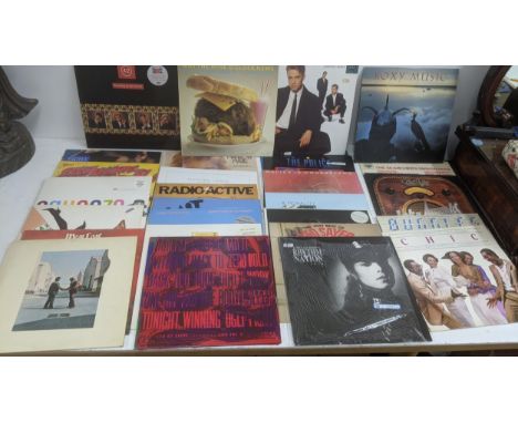 A large collection of Rock & Pop LPs and single from pre 1970s onwards to include examples from Janet Jackson, George Michael