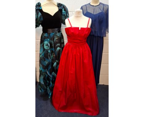Three 1970's/80's ball gowns comprising a Trina Lewis & Marjon Couture navy dress with pink sequin starburst design to the bo