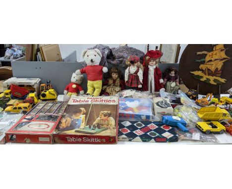 A mixed lot of mainly toys to include vintage Rupert Bears, a boxed Polistil Harley-Davidson, Tonka Toys, board games, Matchb