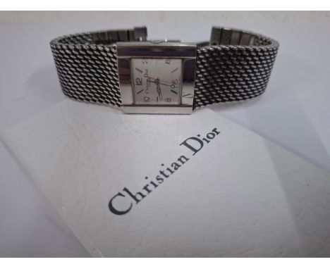 Christian Dior- A unisex stainless steel battery operated wristwatch model D79-100 with square dial and branded watch box. Lo