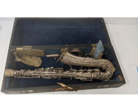 A Jerome Thibouville-Lamy silver plated alto saxophone inscribed on side with mouthpiece in a travel case Location:If there i