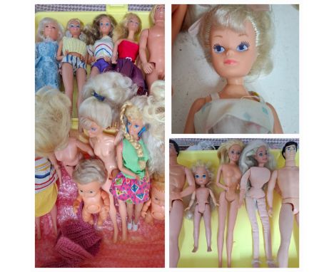 A quantity of 1970's and later dolls A/F to include Barbie, Sindy 033055X, 2 Jesmar baby dolls, Action Man, Ken, Tropical Bar