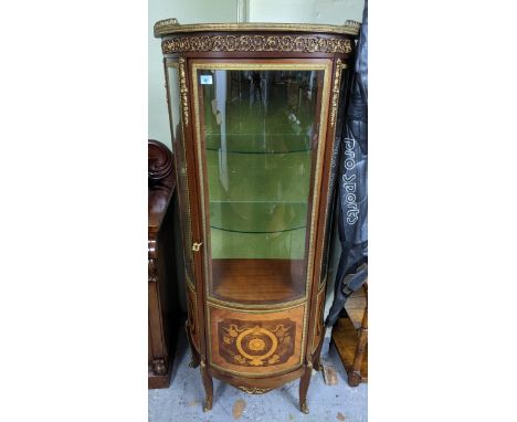 A reproduction Louis XV style vitrine, bow fronted with metal mounts, and inlaid ornament, on cabriole legs, 159 x 70.5 x 36c