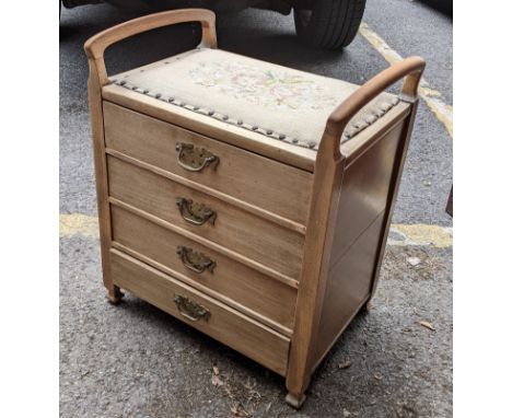 A mid 20th century piano stool having a tapestry top and four music sheet drawersLocation: If there is no condition report, p