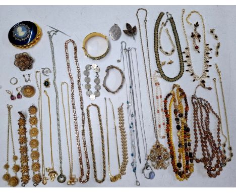 A quantity of mainly 1960's and later costume jewellery to include a Monet tri-gold tone rope twist necklace, a Sarah Coventr