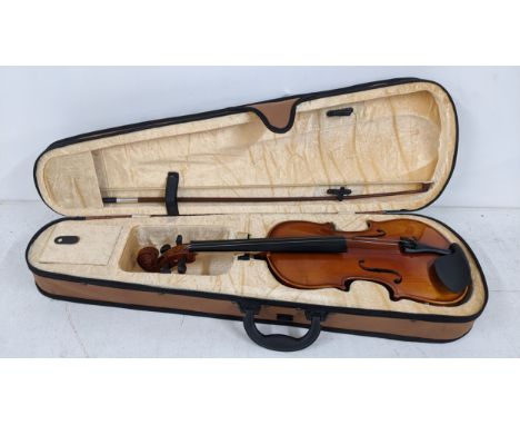 A modern Ashton student violin, housed in a plush-lined zip case, the violin 60cmIf there is no condition report shown, pleas