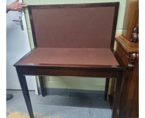 A Victorian mahogany fold over card table with inset baize on square tapering legs, 74.5 x 91.5 x 45.5cms (when unextended)Lo