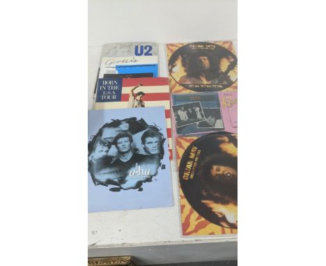 Music related ephemera to include two Brian May and Cozy Powell's Resurrection 12" picture disc records in sealed packets, a 