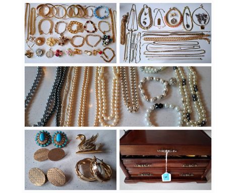 A late 20th Century jewellery chest and contents to include a Monet gold tone necklace and other 1980's gold tone costume jew
