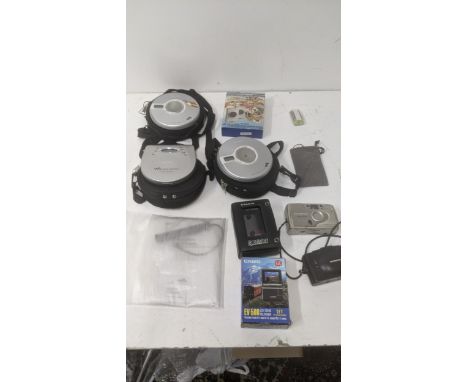 A collection of battery operated items to include three Sony Cd Walkmans, a Sanyo Sportster cassette stereo and other itemsLo