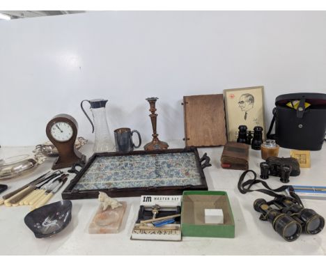 A mixed lot to include vintage binoculars, a crystal cut glass pitcher, a Religious book entitled Godfrey William Smith 1706 