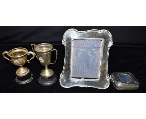 ASSORTED ANTIQUE STERLING SILVER ITEMS To include an Art Nouveau silver picture frame, 18.5 x 15.5cm, two silver trophy cups 