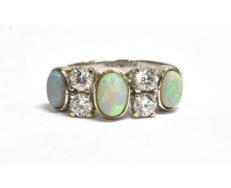 OPAL &amp; DIAMOND DRESS RING 18ct white gold, three bezel set oval white opal cabochons, estimated to total 0.97 carats, alt