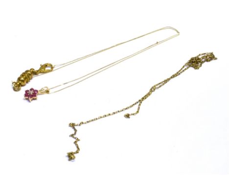 RUBY &amp; DIAMOND PENDANT ON 9CT GOLD CHAIN A 7.5mm floral cluster of estimated 0.49 carats of rubies, with central single c