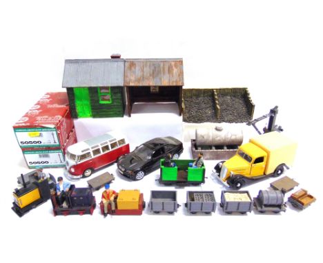 [G SCALE]. ASSORTED LINESIDE ACCESSORIES  including narrow gauge (G scale, OO gauge) locomotives and wagons.