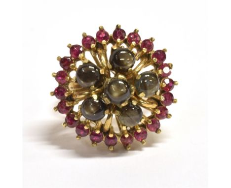 18CT GOLD RUBY &amp; STAR SAPPHIRE RING 19.8mm diameter ballerina style head, set with six round star sapphire cabochons, est
