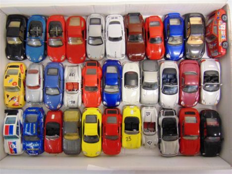 THIRTY-THREE 1/43 SCALE PORSCHE DIECAST MODEL CARS  by De Agostini, Solido, Bburago and others, most mint or near mint, all u