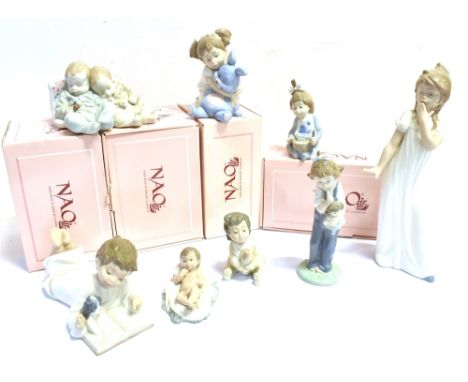 A GROUP OF EIGHT LLADRO/NAO FIGURES  (four boxed) Condition Report : good condition Condition reports are offered as a guide 