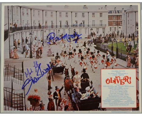 Oliver (R-1972) US Lobby card signed on the front by Mark Lester, Ron Moody & Shani Wallis, 11 x 14 inches.Provenance: This l