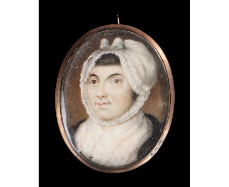 George III miniature portrait, of a lady with a white bonnet and black jacket, brooch mounted, 52mm high