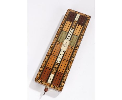 Victorian Masonic Cribbage board, the Tunbridge type edge with Masonic symbol to the centre and plug to the end, 31cm long
