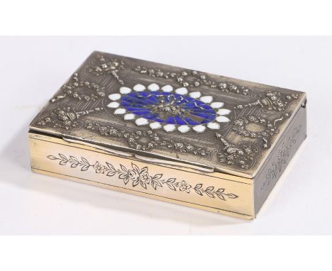 Continental silver box, the lid with blue and white oval enamel decoration and central basket of fruit, foliate border and fo