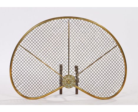 Victorian brass fireguard, with an arched front and iron hooked feet back, 61cm wide